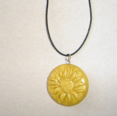 Unique, handmade pendant with the Sun0s motive for men.